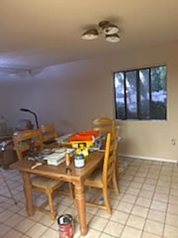 Dining room with finished light-colored walls